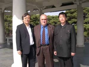Dr Mark Suh, Prof Paolo Cotta-Ramusino with the host, Kim Song